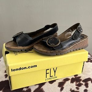 FLY London Tram black leather sandals